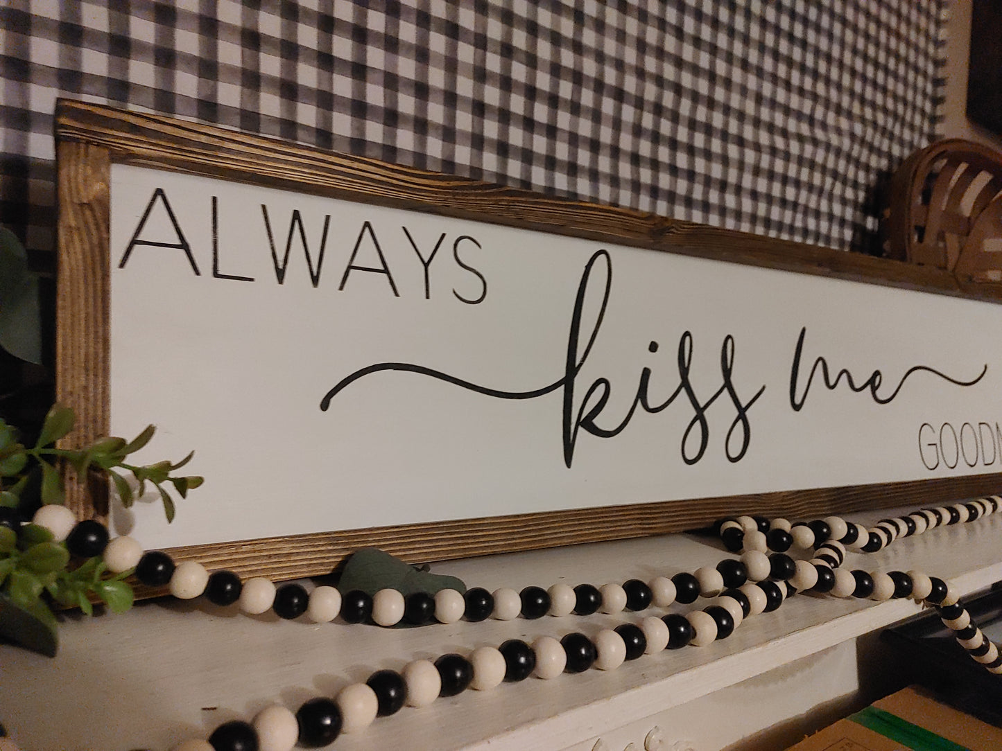 Always Kiss Me Goodnight - above the bed sign