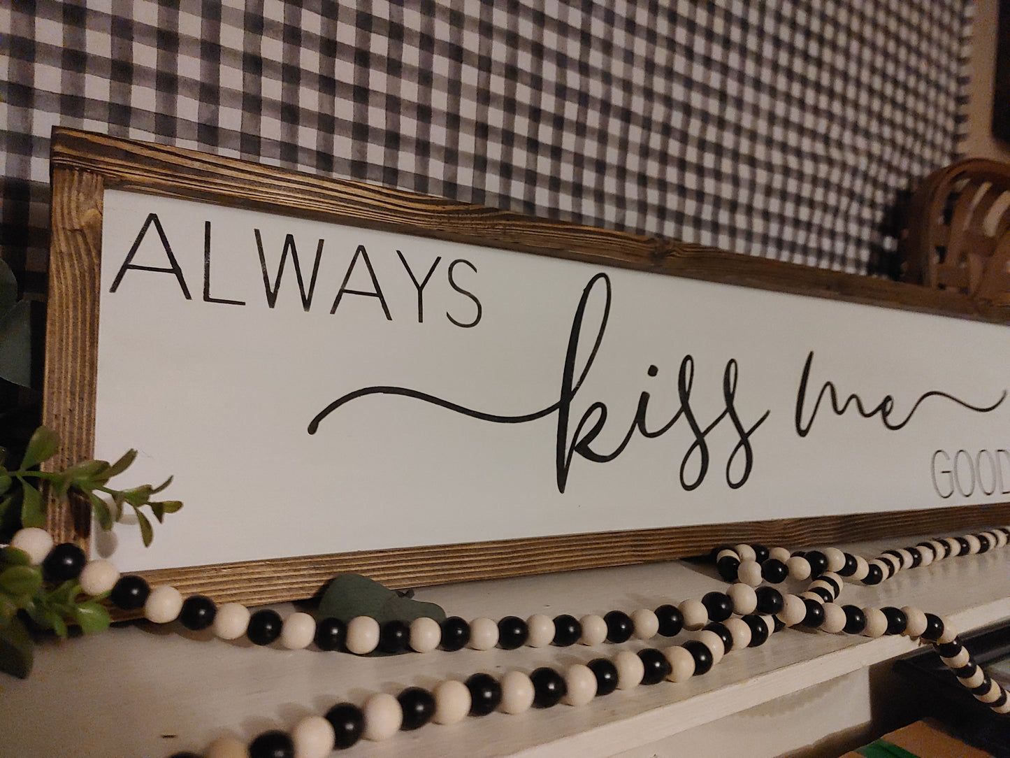 Always Kiss Me Goodnight - above the bed sign