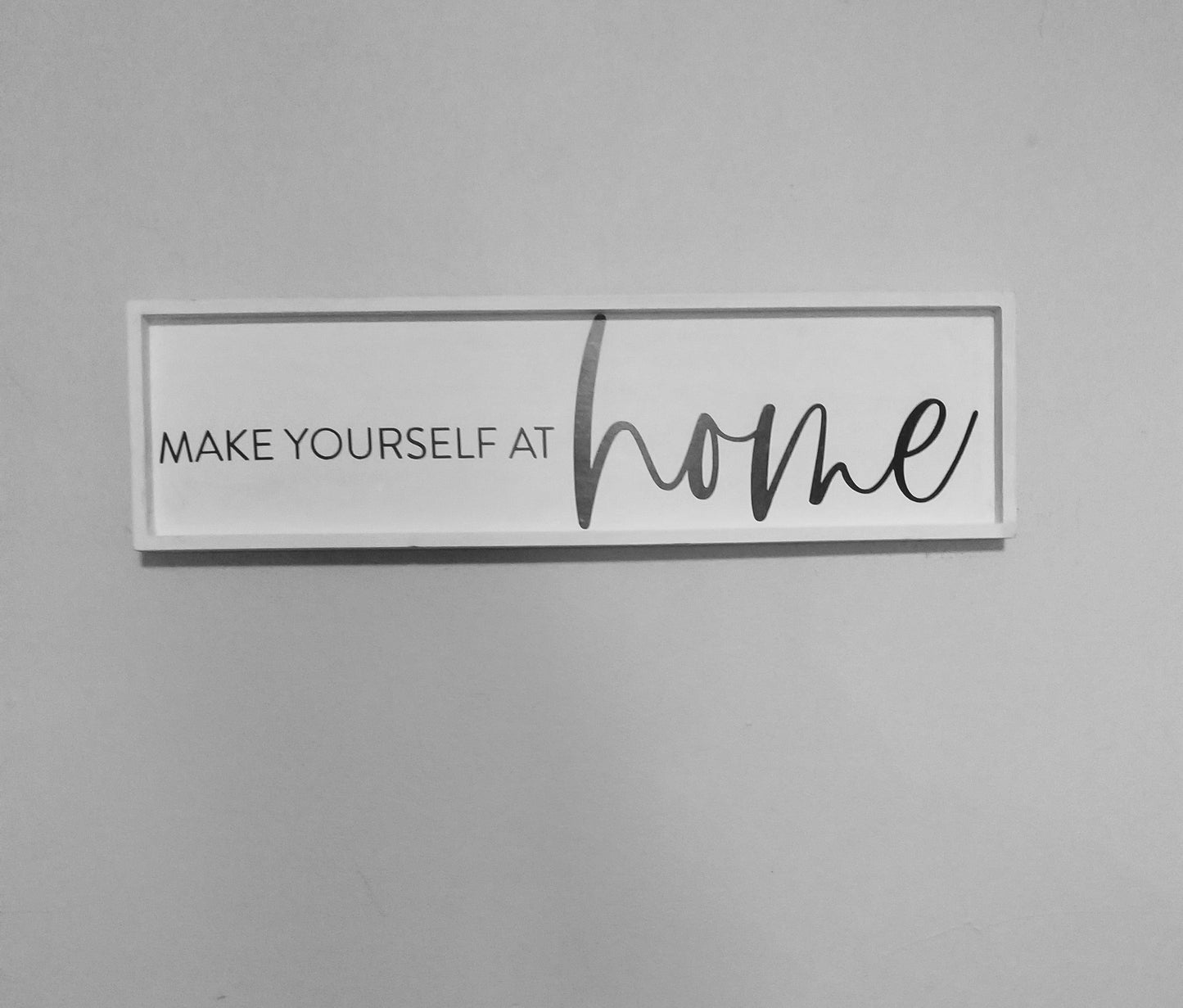 Make yourself at home Sign